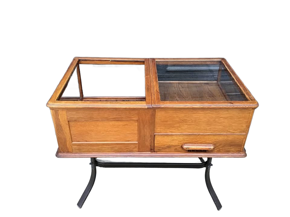 Display cabinet with coin drawer