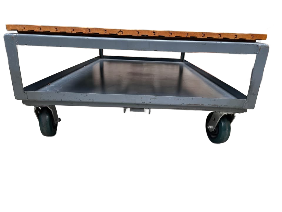 Extra large industrial-style coffee table with solid wood top and gray metal base on wheels