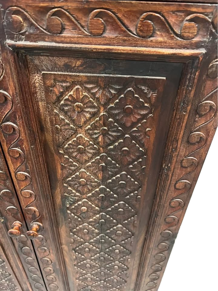 Carved Indonesian style cabinet