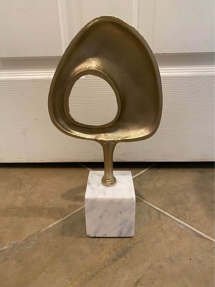 Abstract MCM vibe metal gold toned loop sculpture on block of solid white marble; 13”H x 6.5” W x 1”