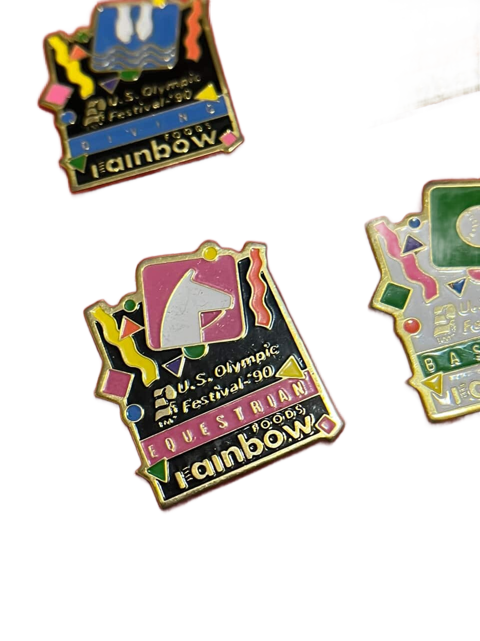 Collection of U.S. Olympic Festival 90 pin badges