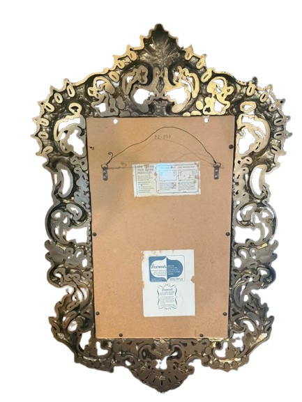 Ornate vintage gold mirror