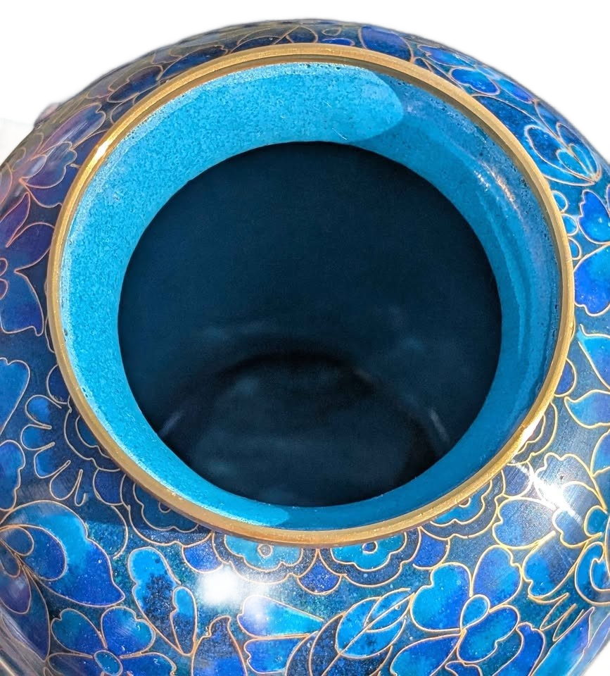 Chinise Zi Jim Cheng blue floral metal Cloisonne jar with a wooden stand.