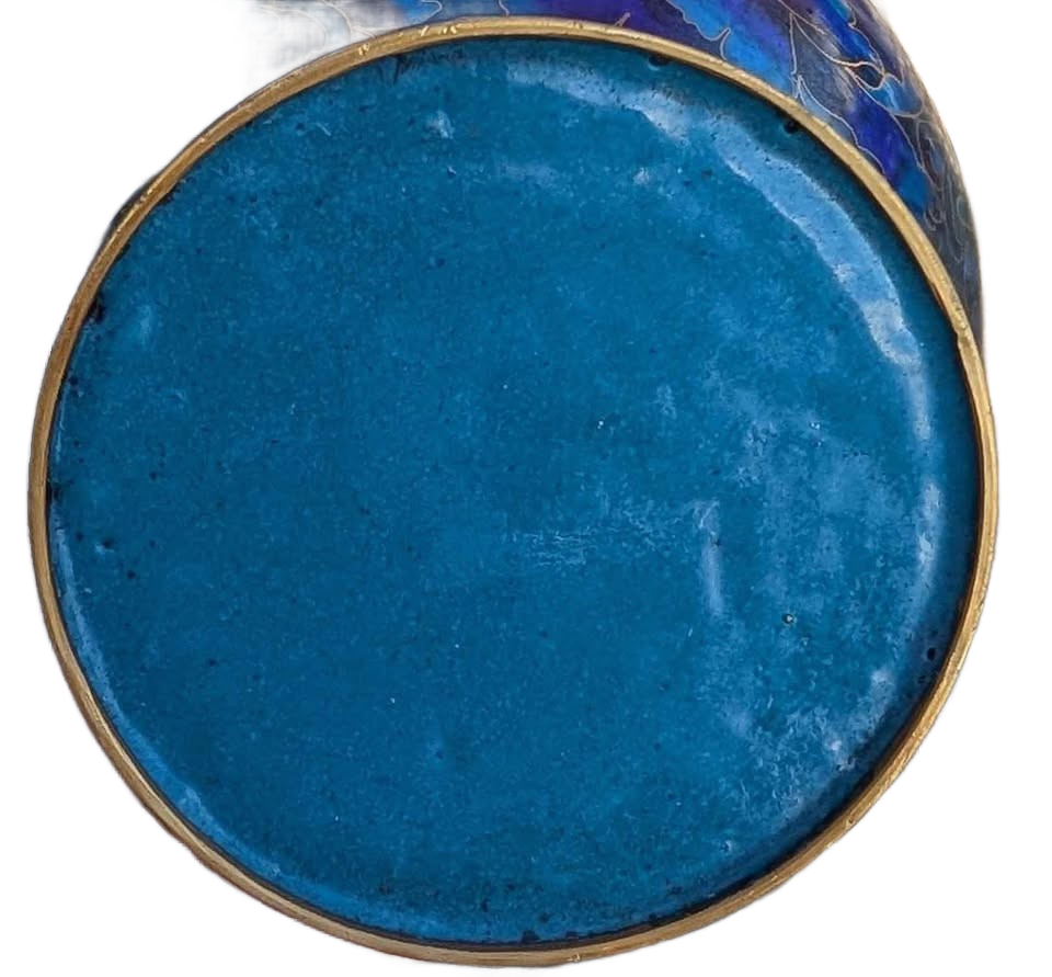 Chinise Zi Jim Cheng blue floral metal Cloisonne jar with a wooden stand.