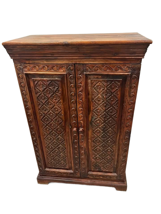 Carved Indonesian style cabinet