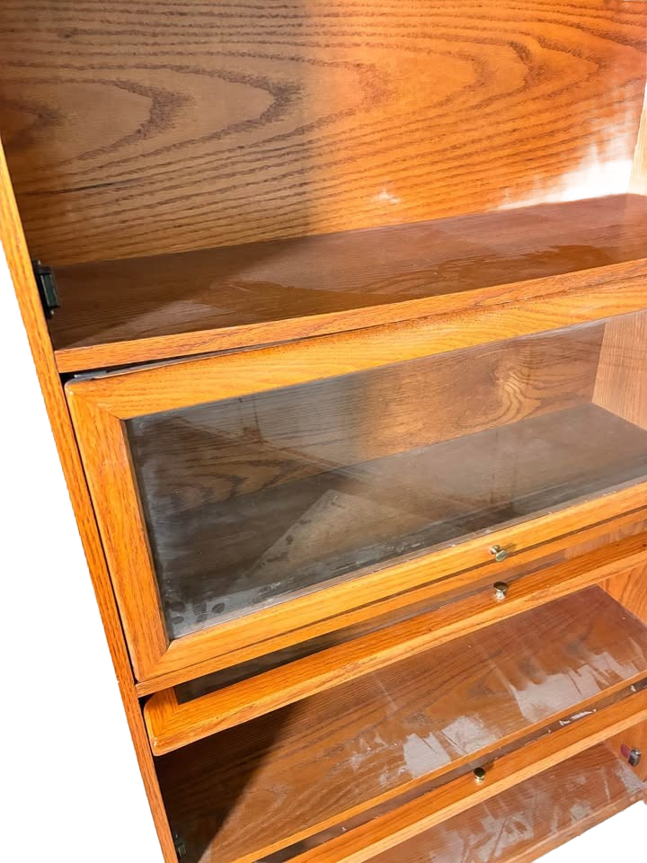 Vintage oak barristers cabinet, pocket doors, brass hardware.